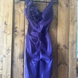 Beautiful deep purple ruched dress with rosettes.